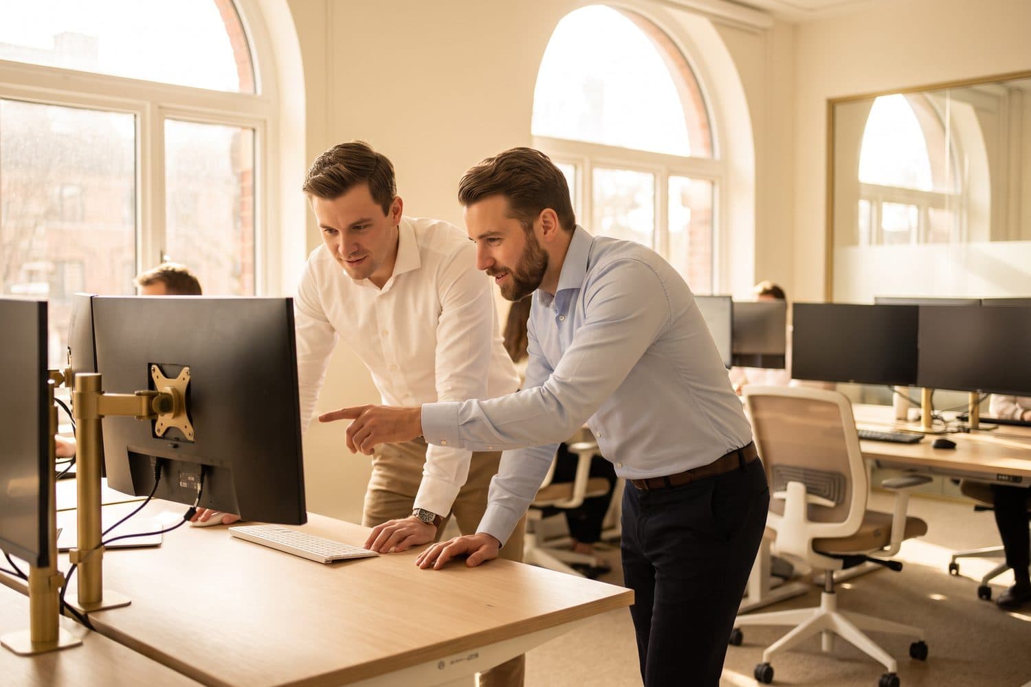 Two brokers working a file together